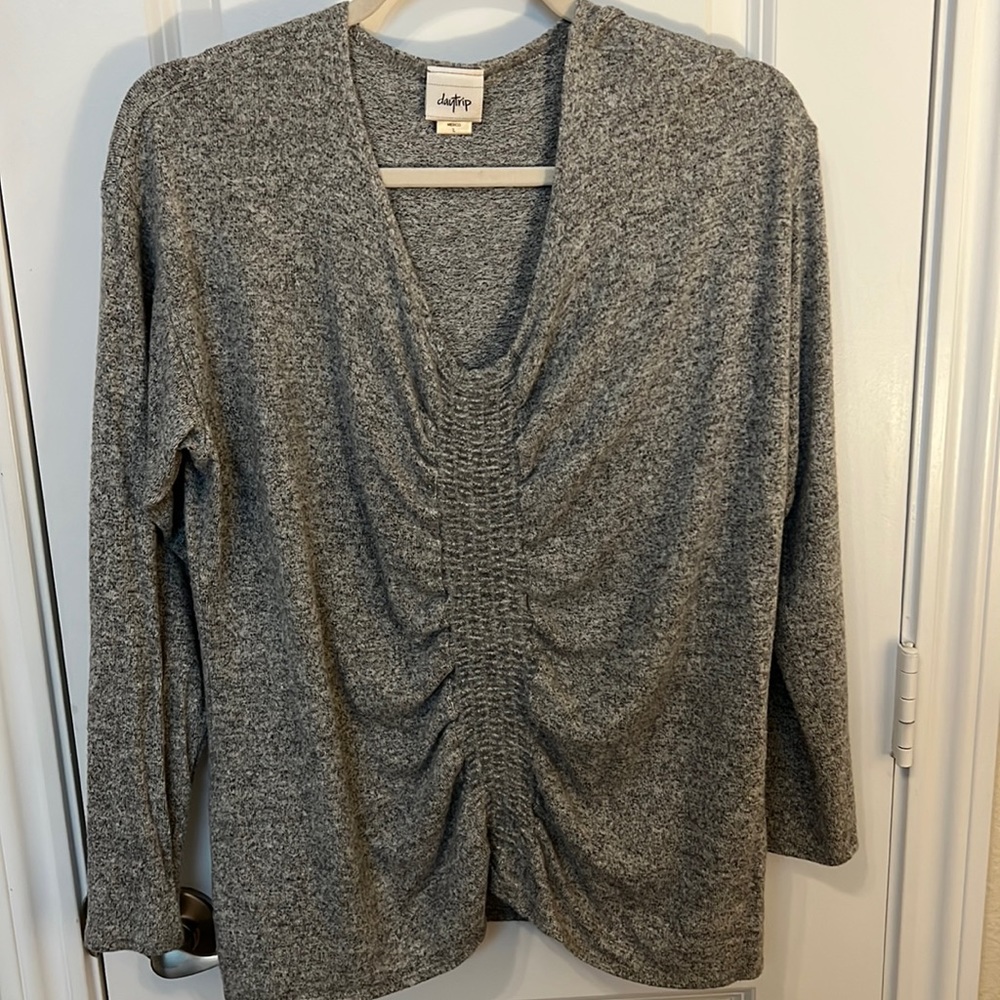 Daytrip heathered Grey light sweater with rouched front detail. V-neck.